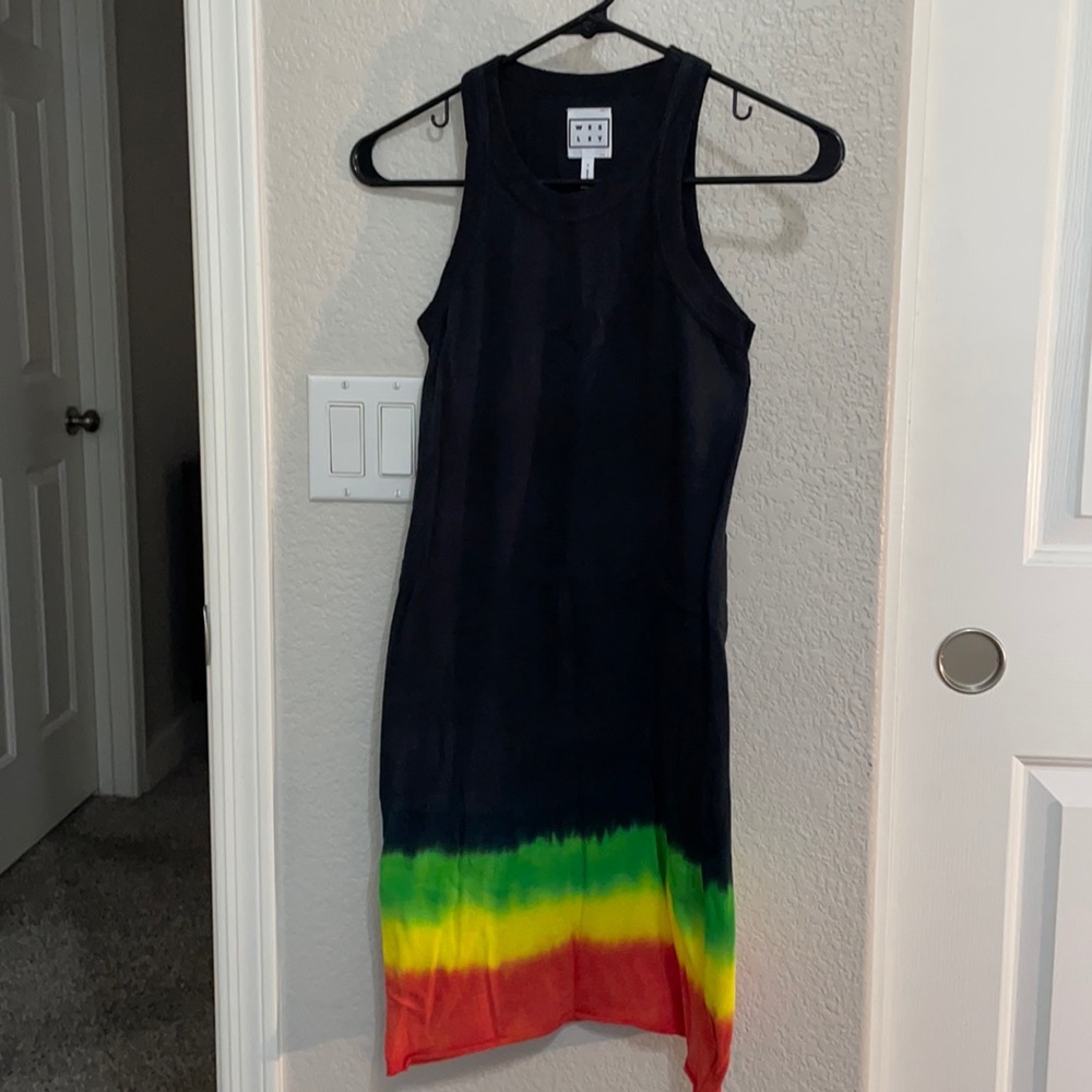 Black bodycon dress with Rasta colored hem. Women’s size small.